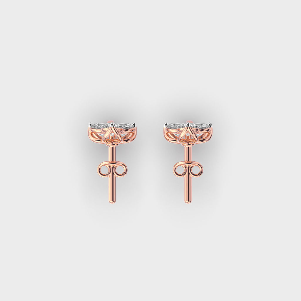 Top view of rose gold three-stone floral earrings with precision-set lab grown diamonds.