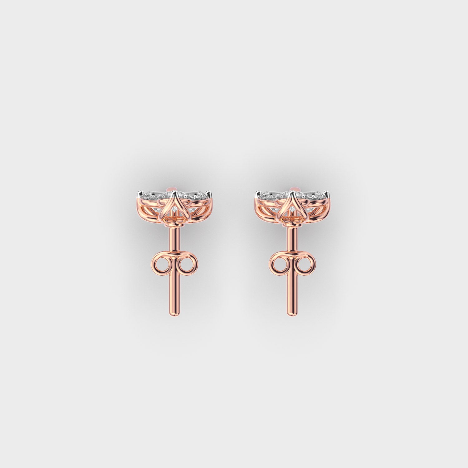 Top view of rose gold three-stone floral earrings with precision-set lab grown diamonds.