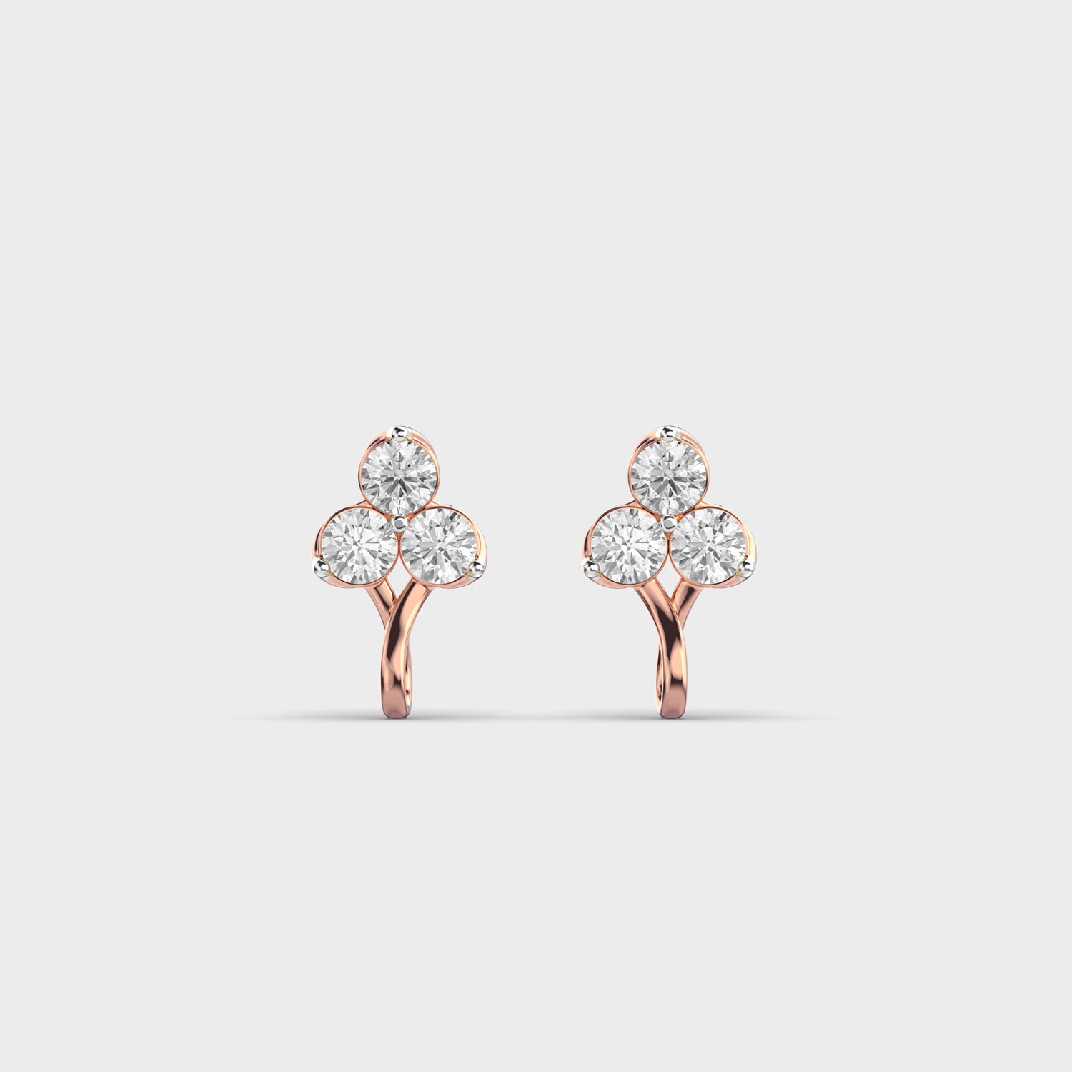 Front view of rose gold TriBloom diamond earrings featuring EF-color round diamonds in a delicate petal cluster.