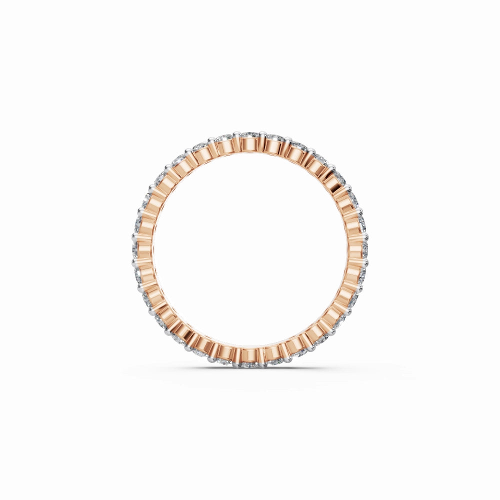 Top view showing the blush-toned rose gold band wrapped in continuous round-cut diamonds.