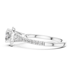 Side profile of cushion halo solitaire diamond ring showcasing elevated prong setting and diamond shank