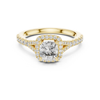Cushion halo solitaire diamond ring featuring a cushion-cut center stone with round diamond halo in gold