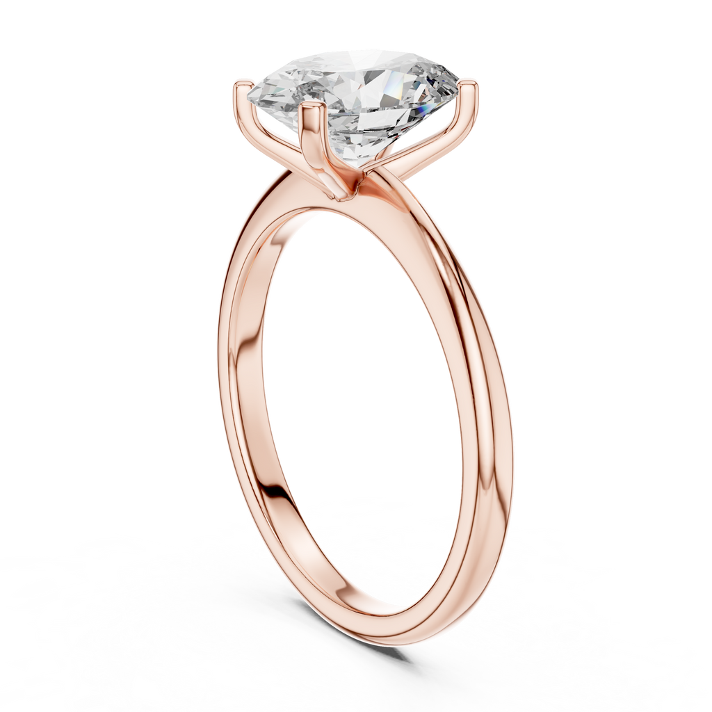 Top view of oval solitaire diamond ring in rose gold focusing on shimmering center stone