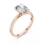 Angled top view of oval solitaire diamond ring in rose gold capturing sparkling brilliance