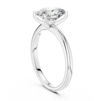 Top perspective of oval solitaire diamond ring in white gold focusing on radiant diamond