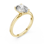 Angled view of oval solitaire diamond ring in yellow gold capturing brilliance and shine