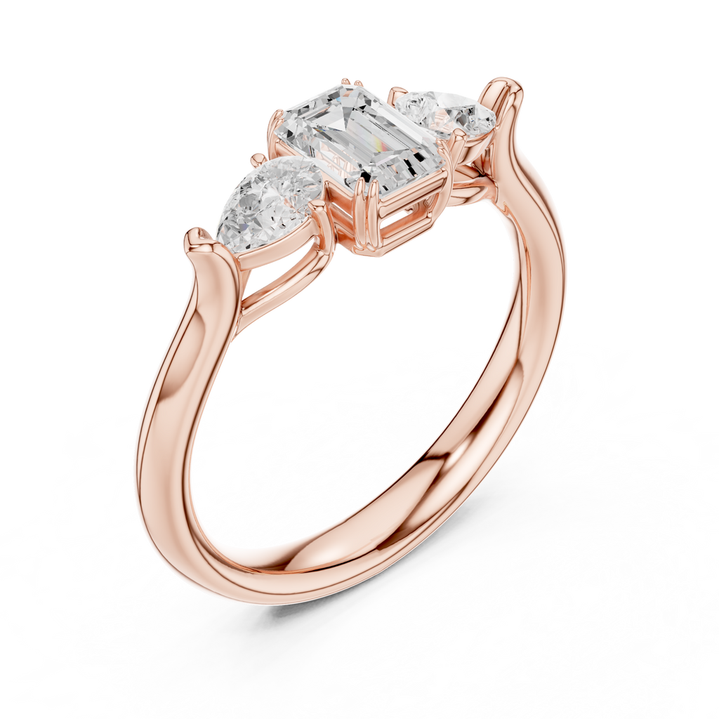 Emerald cut three stone diamond ring