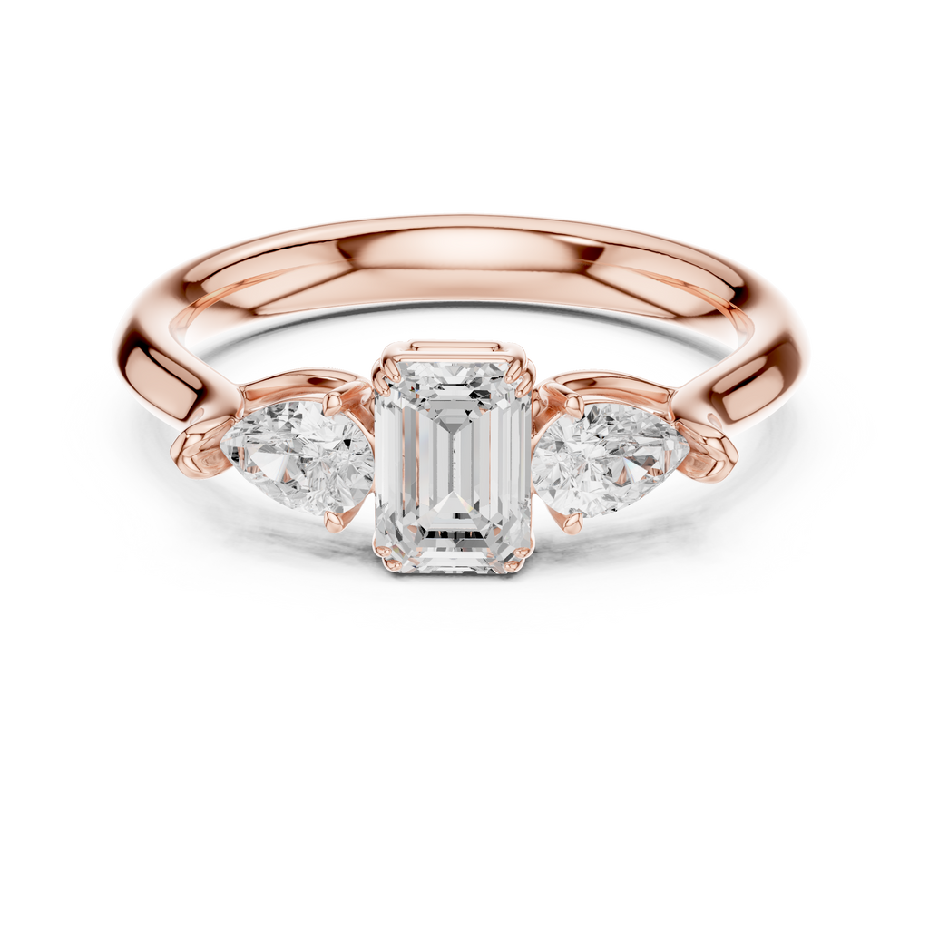 Emerald cut three stone diamond ring