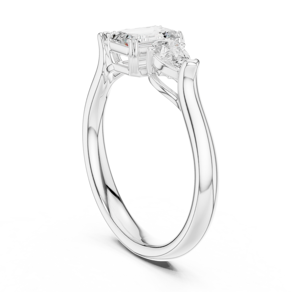 Emerald cut three stone diamond ring