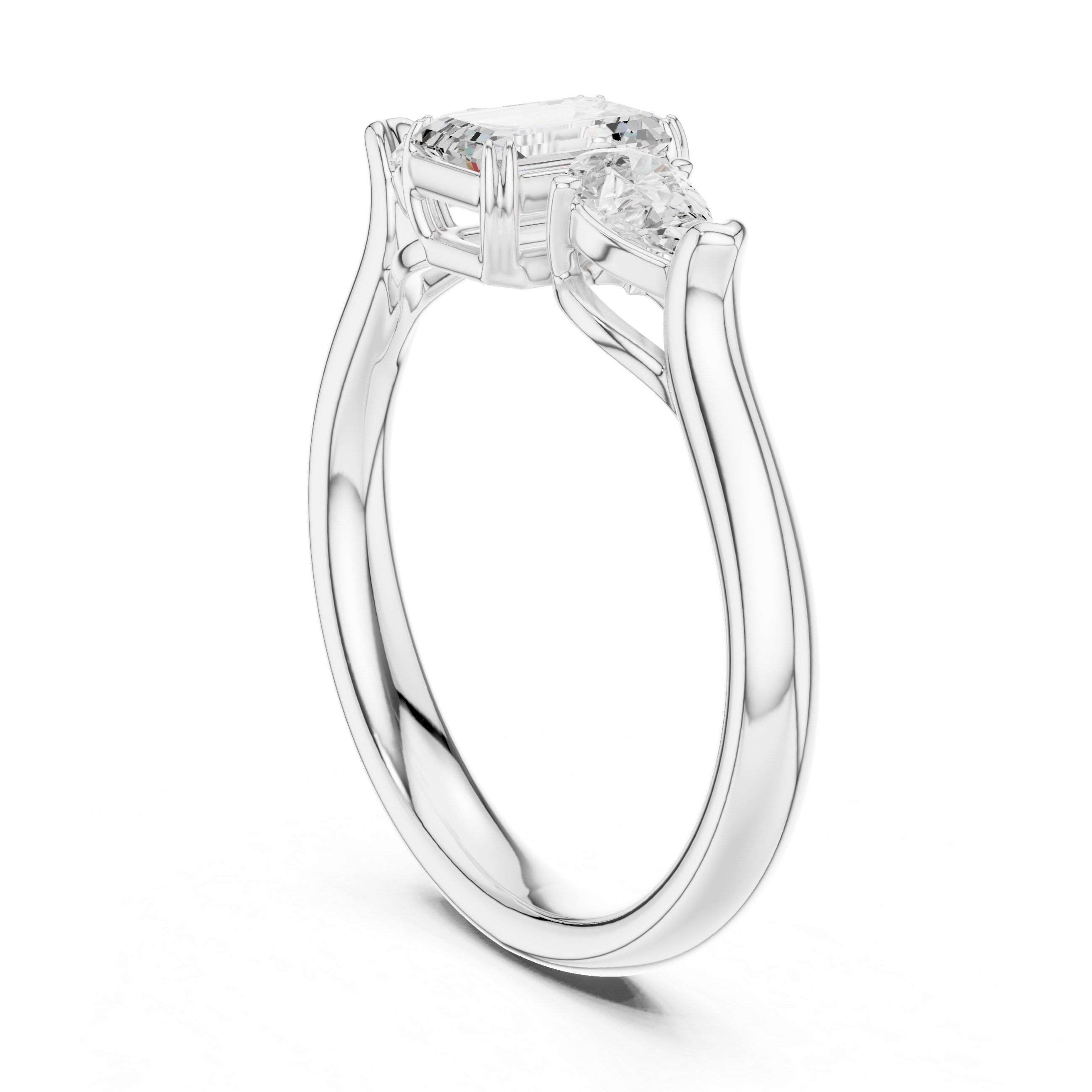 Emerald cut three stone diamond ring