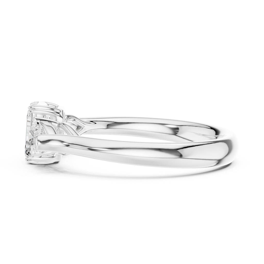Emerald cut three stone diamond ring