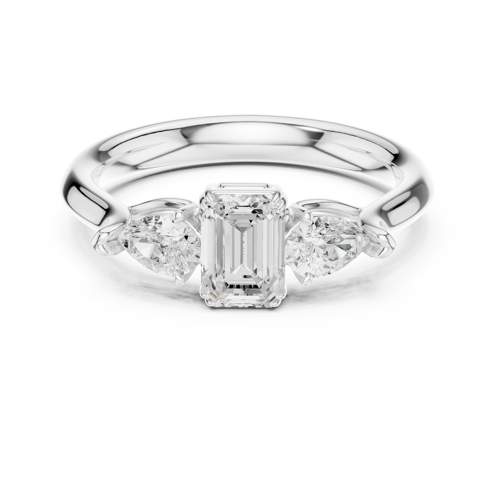 Emerald cut three stone diamond ring