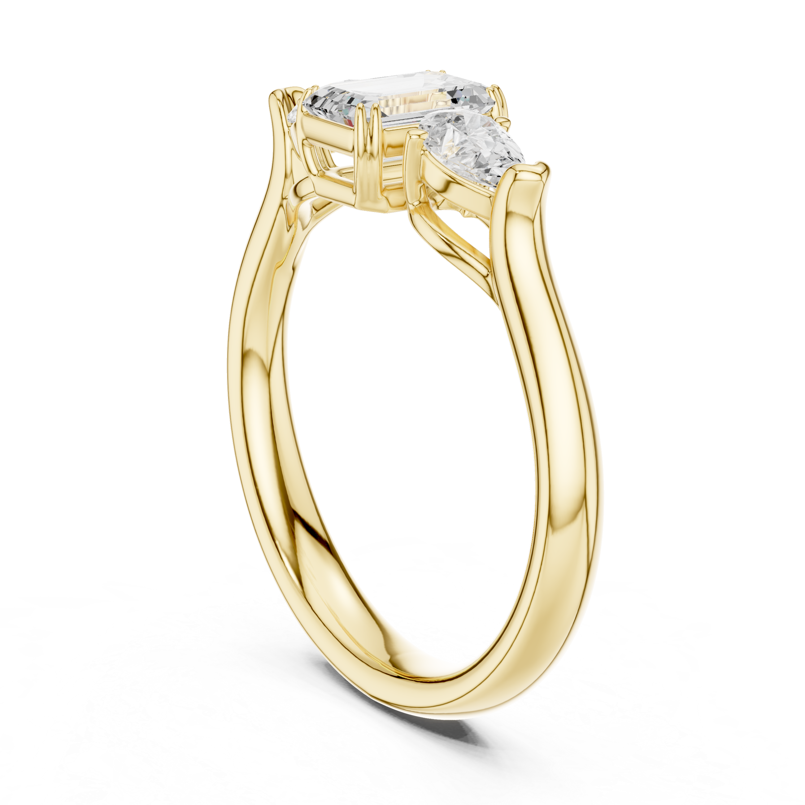 Emerald cut three stone diamond ring