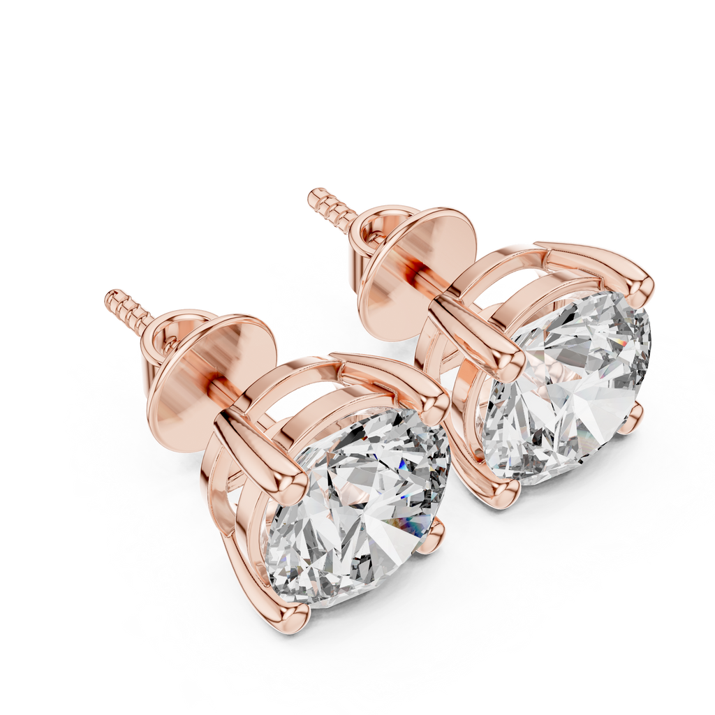 Rose gold round solitaire diamond stud earrings photographed from the top, highlighting symmetrical prong placement and diamond sparkle