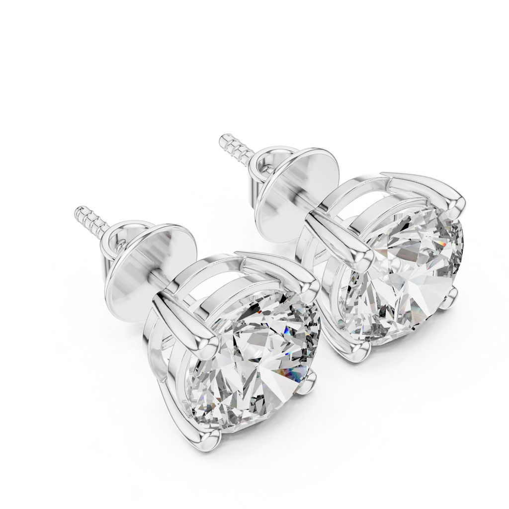 White gold solitaire diamond stud earrings top view displaying precision-set round brilliant diamonds and balanced prong alignment