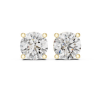 Top view of yellow gold diamond stud earrings emphasizing round brilliant cut diamonds and clean minimalist setting