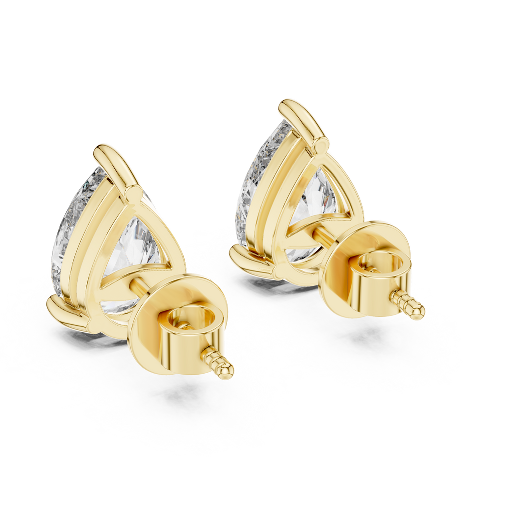 Gold earrings with clear gemstones on a white background