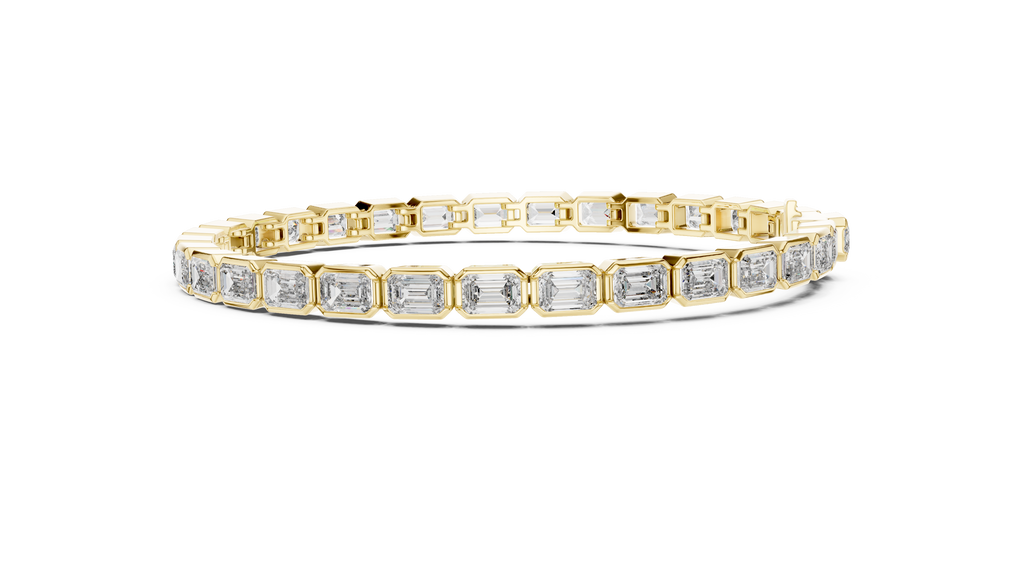 Front view of emerald bezel diamond tennis bracelet in yellow gold featuring emerald-cut diamonds in a sleek bezel setting