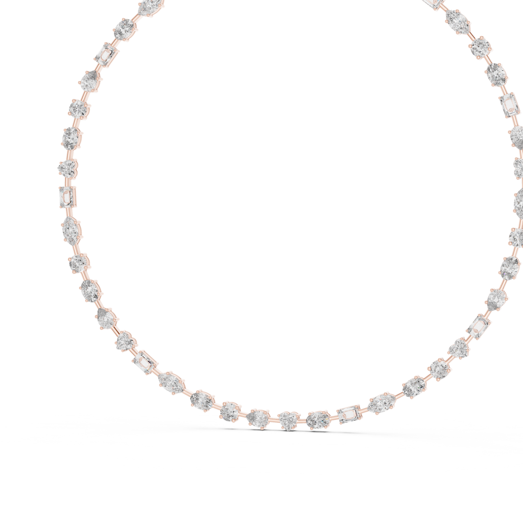 Close-up side angle of rose gold collet set diamonds highlighting smooth edges and modern craftsmanship