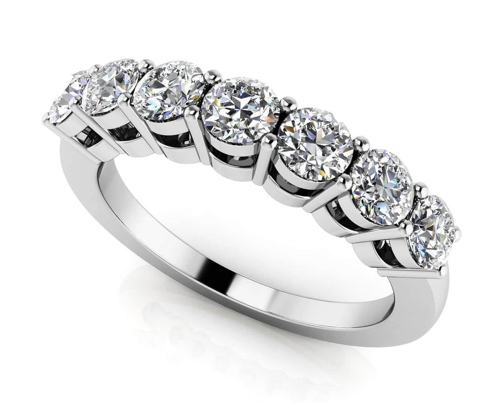White gold 7-stone half eternity ring with round lab-created diamonds, shown on a white background with clear details of the band and diamond settings.