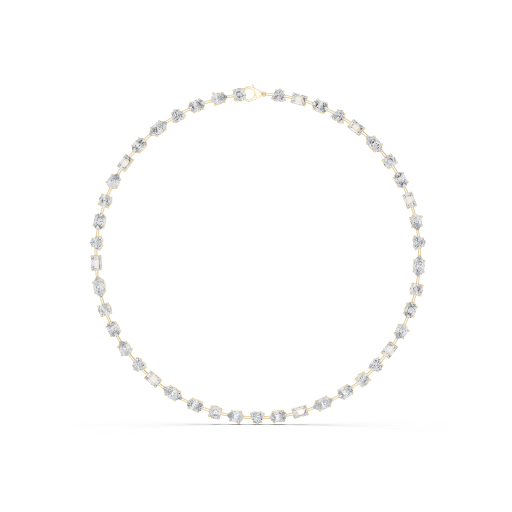 Close-up front view of mixed shape diamond necklace in yellow gold featuring round, oval, marquise, heart, emerald and pear diamonds in collet settings