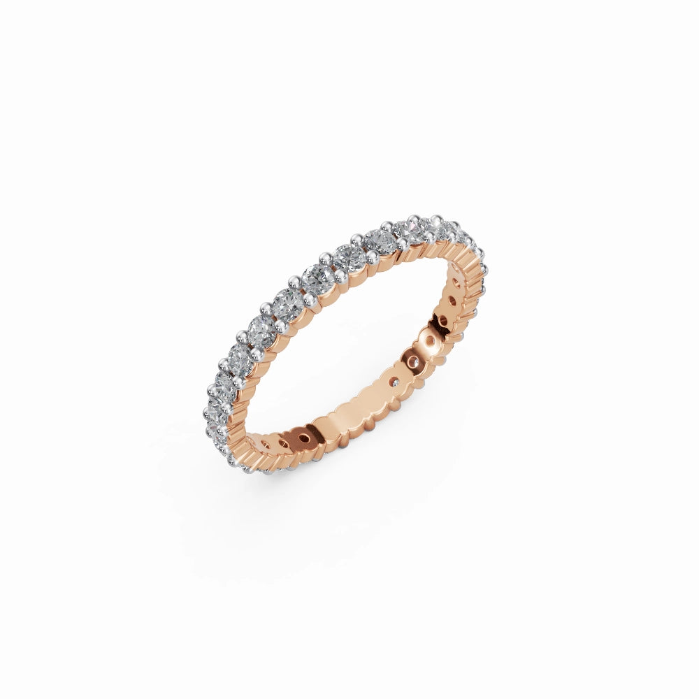 Rose gold eternity ring captured at an artistic 45° angle highlighting its warm glow and brilliant sparkle.