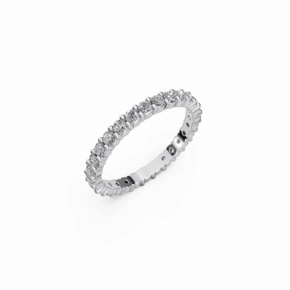White gold eternity ring shot at 45°, highlighting crisp shine and high-end luxury look.