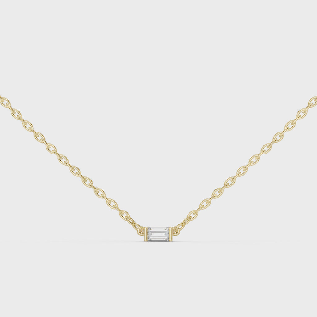 360 degree view of Linea baguette diamond pendant in yellow gold with refined linear design and brilliance