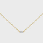 360 degree view of Linea baguette diamond pendant in yellow gold with refined linear design and brilliance