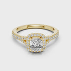 Yellow gold cushion halo solitaire ring with brilliant cushion cut diamond center