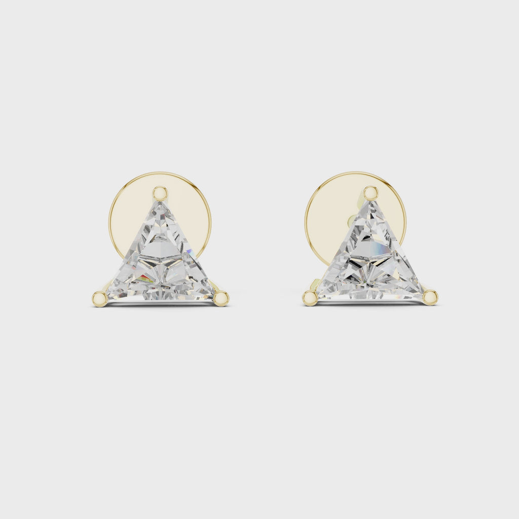 360 degree rotating view of trillion cut diamond stud earrings in yellow gold