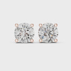 360 degree rotating video of rose gold round diamond stud earrings showcasing full basket setting, prongs, and diamond brilliance from every angle