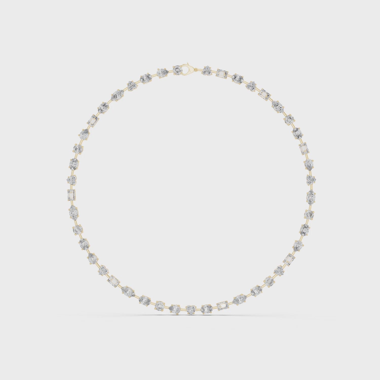 360 degree rotating video of mixed shape diamond necklace crafted in yellow gold with collet setting design