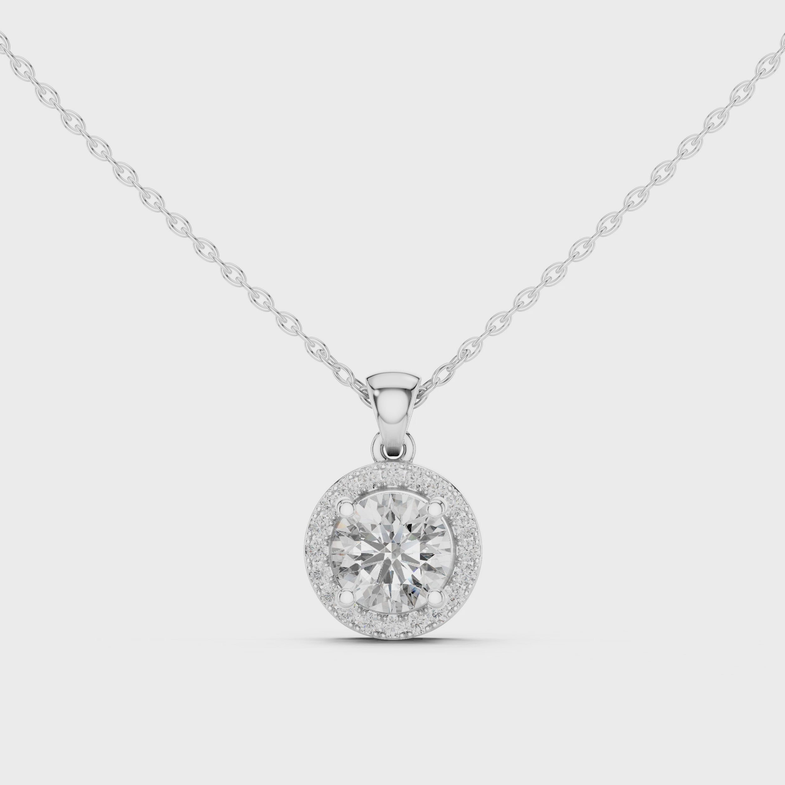 360 degree rotating video of white gold round diamond halo pendant design